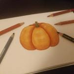 Citrouille dessiné à la main aux crayons aquarellables et crayons de couleurs