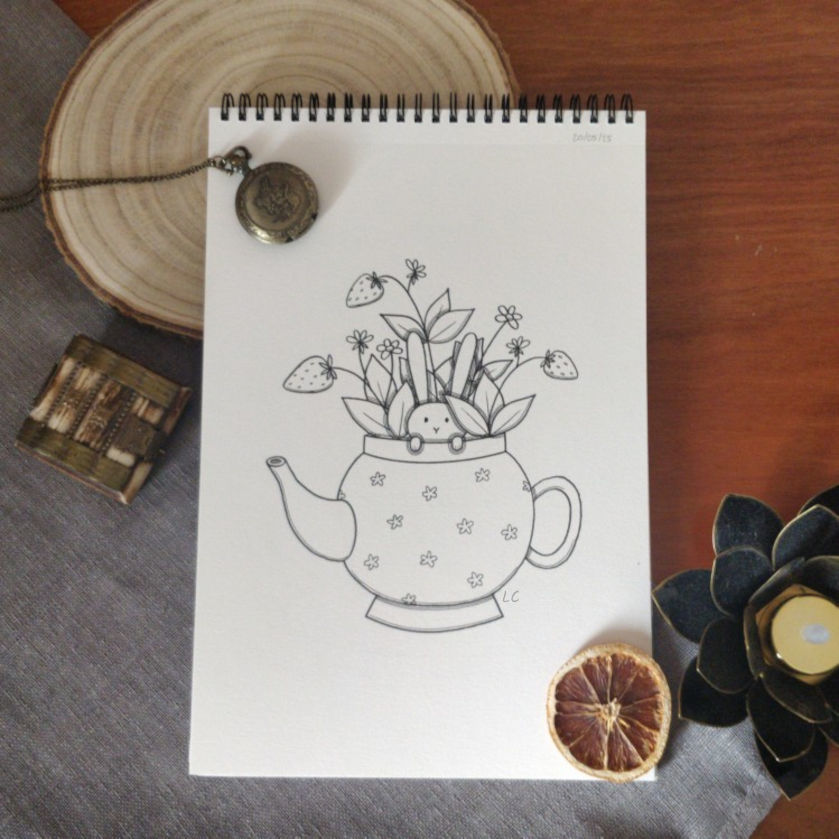 Dessin d'un lapin dans une théière