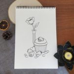 Dessin représentant un muffin entourés de fruits rouges devant un soliflore contenant un coquelicot